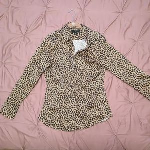 Banana republic tan flower on black top